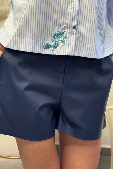 PANTALONCINI IN ECOPELLE CON ELASTICO IN VITA IN COTONE