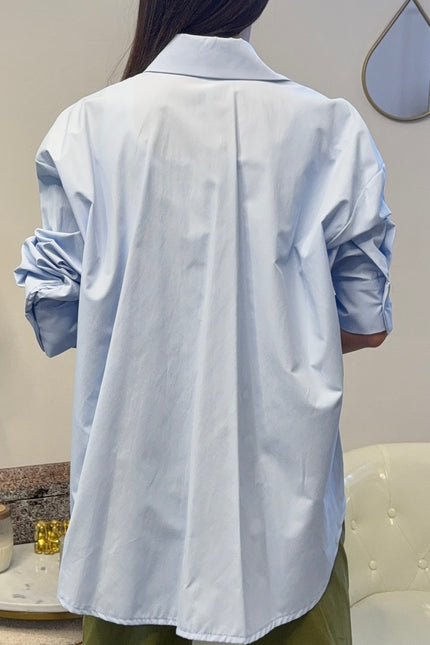 Camicia celeste over tasca paillettes